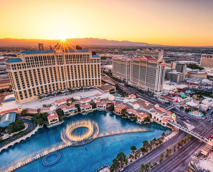aerial view of the las vegas strip and bellagio hotel during sunset
